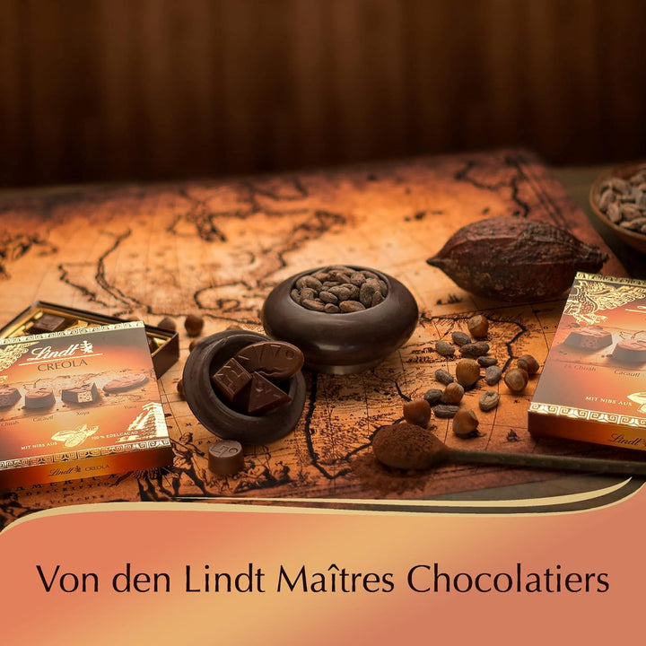 Lindt Schokolade - Creola Pralinés | 100 G | Pralinen Schachtel Mit 9 Pralinen in 4 Köstliche Sorten Ohne Alkohol Mit Kakao Nibs Aus 100 % Edelkakao | Pralinengeschenk | Schokoladengeschenk