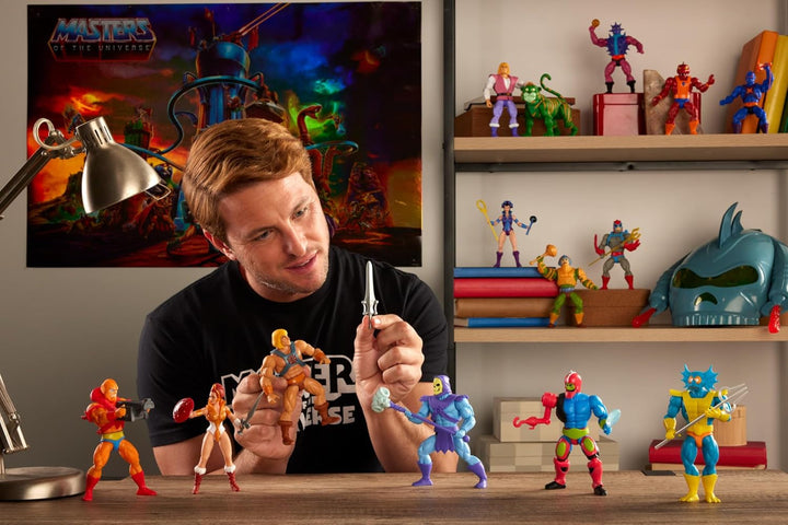 Jucărie Masters of the Universe Origins, figurină Teela din colecția de desene animate, aproximativ 14 cm înălțime Eroina Motu, accesoriu și mini benzi desenate, HYD27